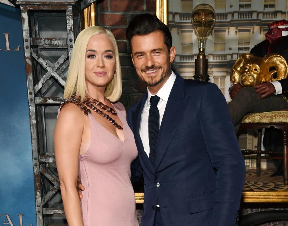 FILE - This Aug. 21, 2019 file photo shows Orlando Bloom, right, a cast member in the Amazon Prime Video series “Carnival Row,” with singer Katy Perry, at the premiere of the series in Los Angeles. (Photo by Chris Pizzello/Invision/AP, File)