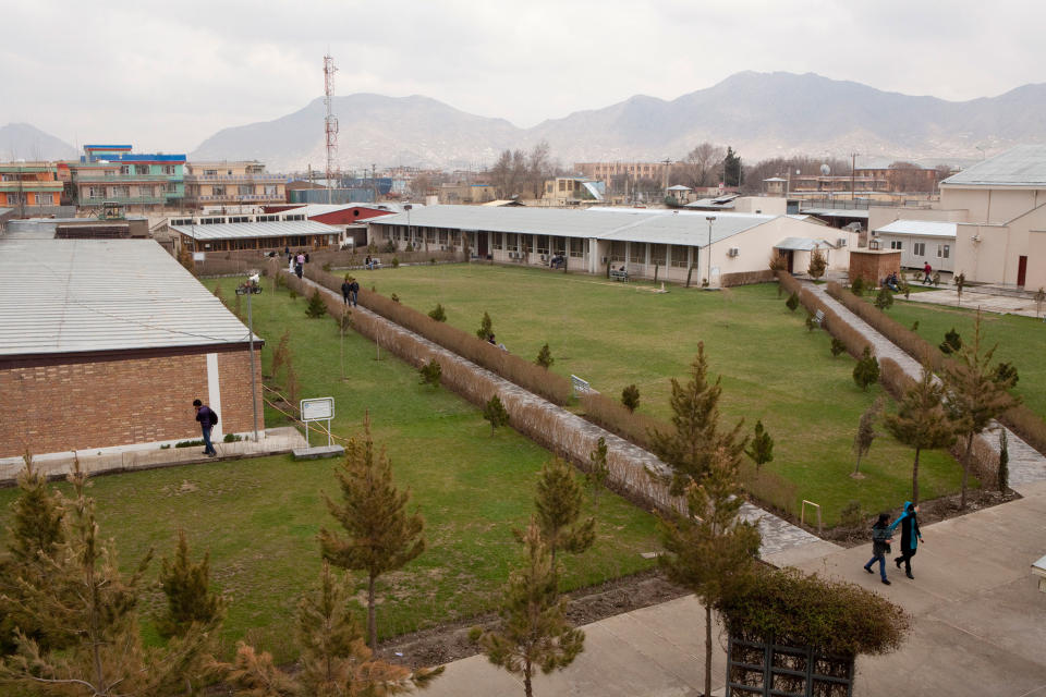 <p>Students walk through campus at the American University of Kabul on March 31, 2012 in Kabul, Afghanistan. (Melanie Stetson Freeman/The Christian Science Monitor via Getty Images) </p>