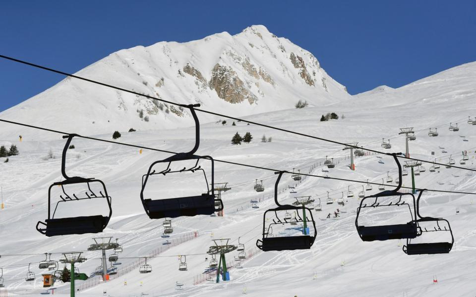 Closed ski lifts are pictured in Ponte di Legno - Flavio Lo Scalzo/Reuters