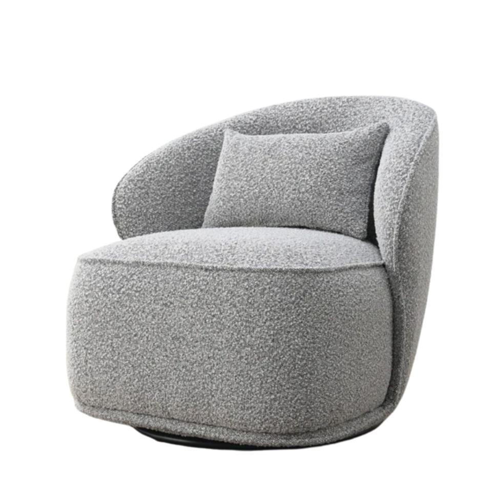 Arijit 33" Wide Boucle Swivel Barrel Chair in grey with a throw pillow