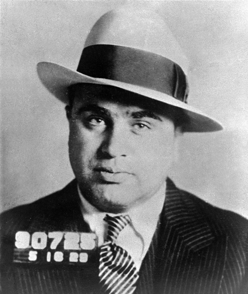 FILE - Chicago gangster Al Capone has his photo taken while in custody in Philadelphia, May 18, 1929, on charges of carrying concealed weapons. The The Eastern State Penitentiary, which is now a museum, has made a recreation of Capone's cell. (AP Photo)