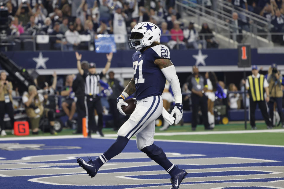 Dallas Cowboys running back Ezekiel Elliott (21) scores a touchdown during an NFL Football game in Arlington, Texas, Thursday, Nov. 24, 2022. (AP Photo/Michael Ainsworth)