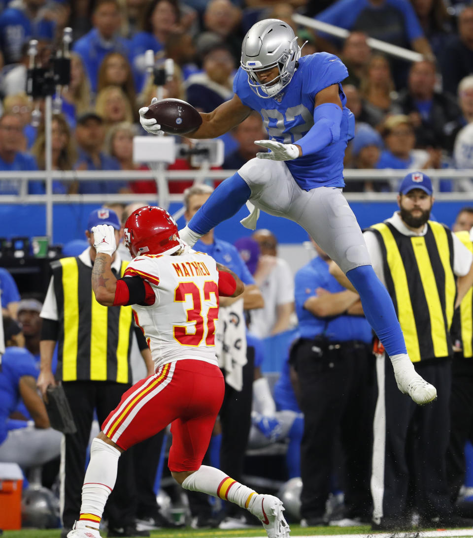 Detroit Lions tight end Logan Thomas (82) attempts a jump over Kansas City Chiefs strong safety Tyrann Mathieu (32) during the second half of an NFL football game, Sunday, Sept. 29, 2019, in Detroit. (AP Photo/Paul Sancya)