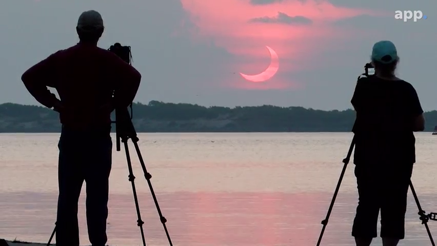 Steve Waite and his wife Sheryll traveled from Pennsylvania to High Bar Harbor to photograph the 2021 solar eclipse rising near the Barnegat Lighthouse.