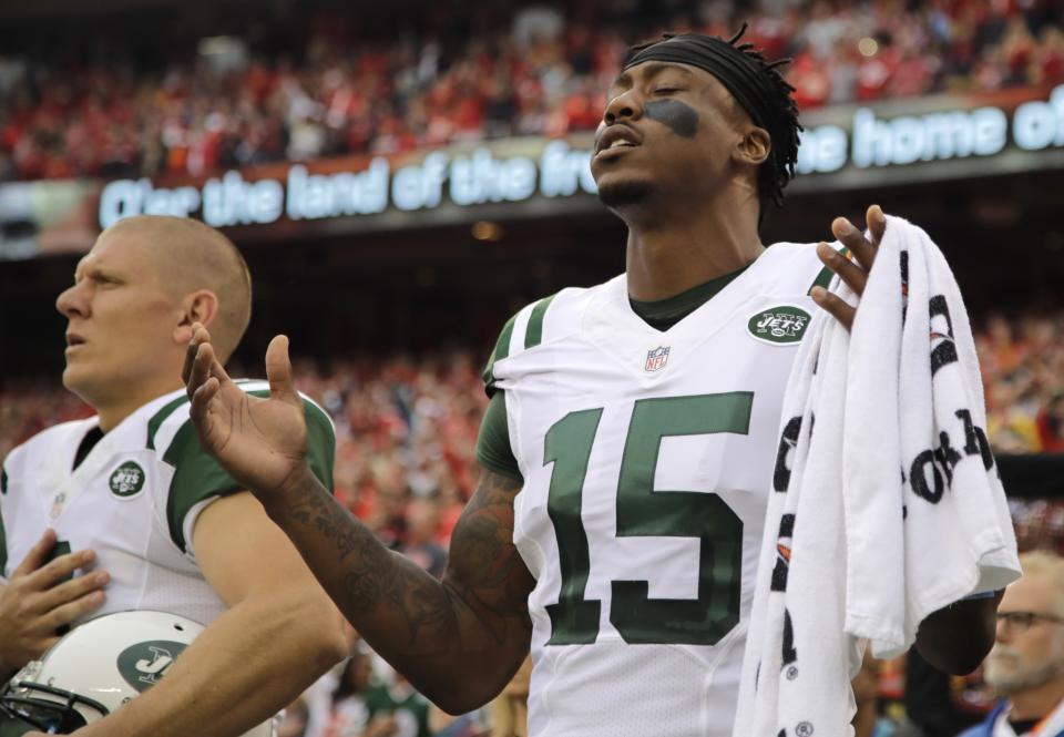 <p>New York Jets wide receiver Brandon Marshall (15) gestures during the playing of the national anthem before an NFL football game against the Kansas City Chiefs in Kansas City, Mo., Sunday, Sept. 25, 2016. (AP Photo/Charlie Riedel) </p>