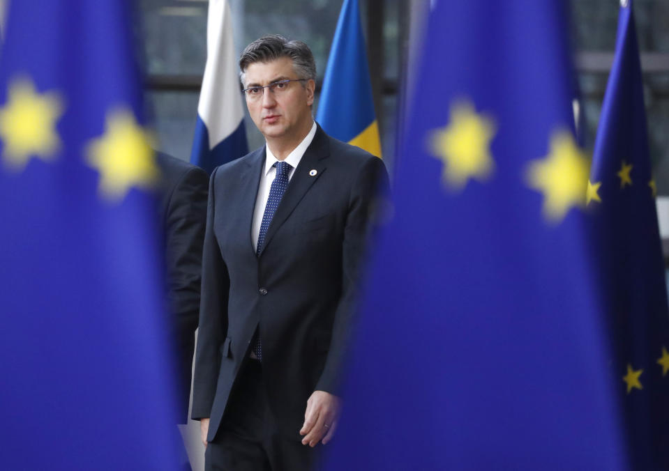 Croatian Prime Minister Andrej Plenkovic arrives for an EU summit in Brussels, Friday, March 22, 2019. European Union leaders gathered again Friday after deciding that the political crisis in Britain over Brexit poses too great a threat and that action is needed to protect the smooth running of the world's biggest trading bloc. (AP Photo/Frank Augstein)