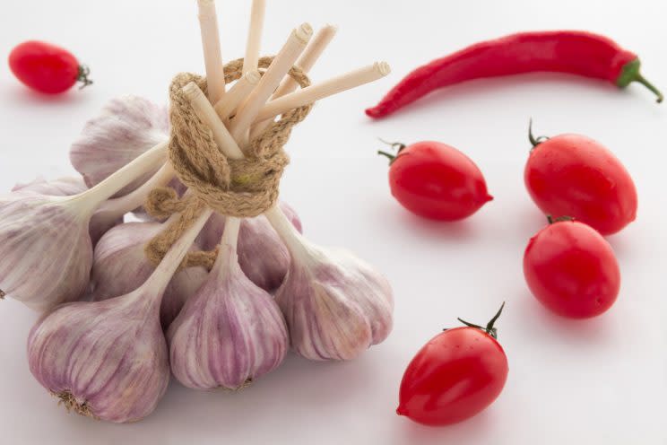 Neither garlic or tomatoes should be kept in the fridge [Photo: Getty]