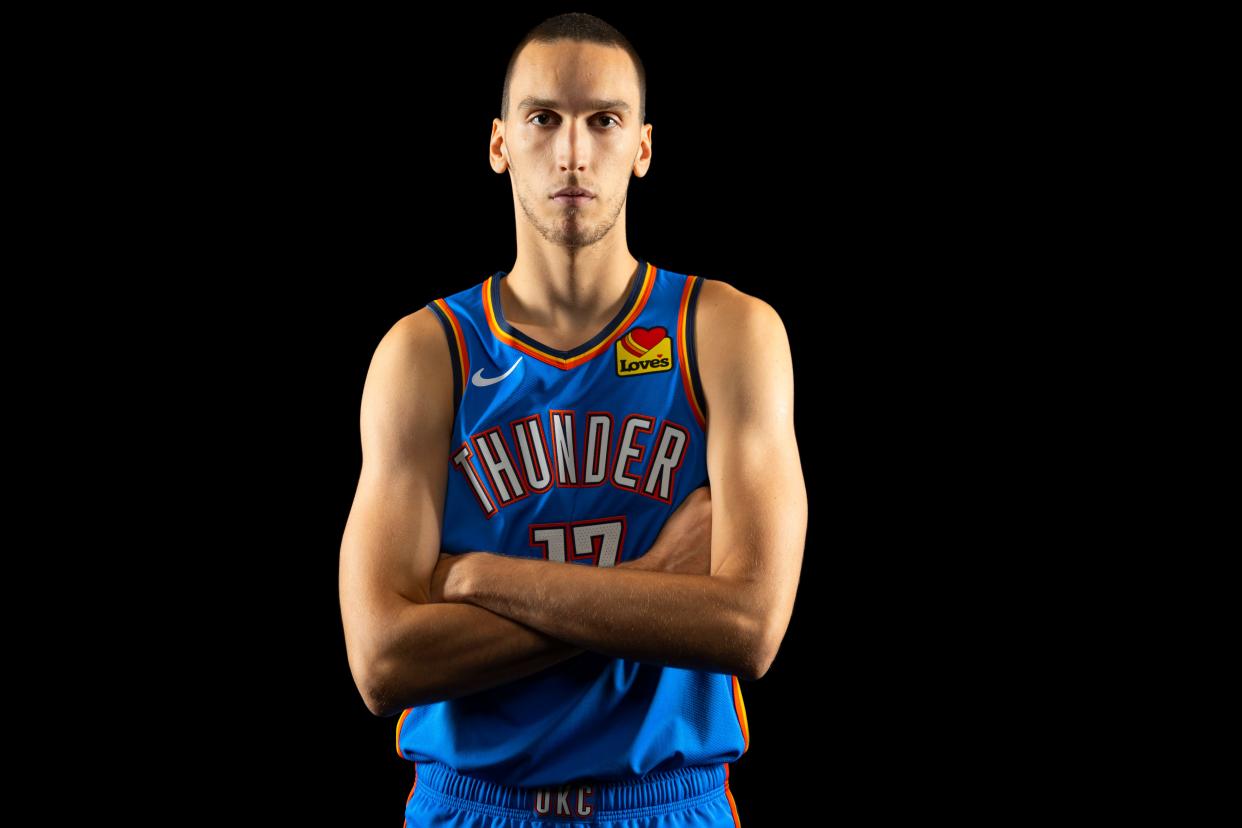 Oklahoma City's Aleksej Pokusevski (17) poses for a photo during the Oklahoma City Thunder media day Omni Hotel and Oklahoma City Convention Center, Monday, Oct. 2, 2023.