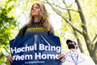 Caroline Hansen, left, participates in a rally and vigil for Val Gaiter, the longest serving woman in the New York state prison system, Thursday, Aug. 11, 2022, in New York. Hansen used to hand-deliver two packages containing fresh food, meats, and vegetables a month to her husband, who is serving life without parole at Sullivan Correctional Facility for murder, but now has to send him packages containing food and other essentials through a third-party vendor. (AP Photo/Julia Nikhinson)