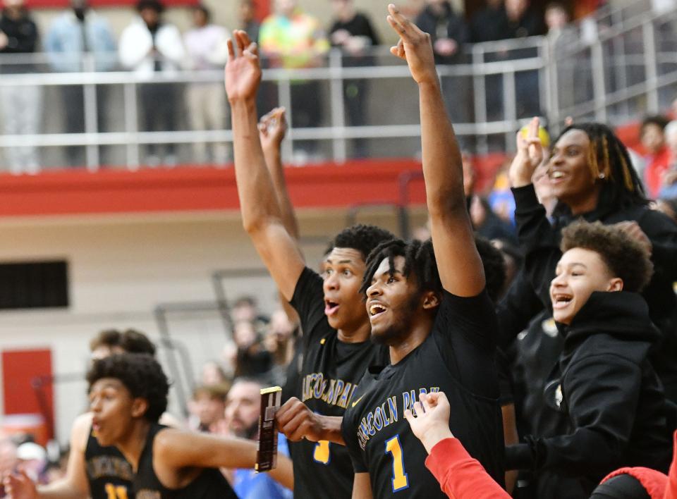 The Lincoln Park Leopards celebrate their win against Uniontown, Monday at Charleroi High School.