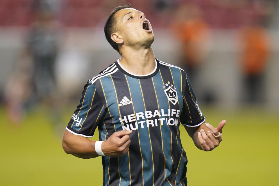 Los Angeles Galaxy's Chichartio reacts as he runs up field in the second half during an MLS soccer match against the Vancouver Whitecaps Wednesday, June 23, 2021, in Sandy, Utah. (AP Photo/Rick Bowmer)
