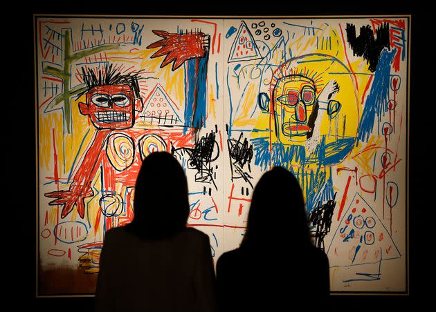 In 2013, visitors look at an untitled painting by Jean-Michel Basquiat before an auction at Christie's in London. On Tuesday in Quebec, two parents took legal action after their children's assignments to create art in the style of Basquiat allegedly turned up for sale on an online site.