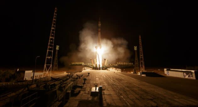 A Russian Soyuz rocket lifts off from the Baikonur Cosmodrome in Kazakhstan, sending three spacefliers to the International Space Station. (NASA Photo / Bill Ingalls)