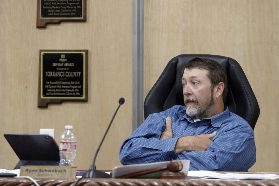 Torrance County Commission Chairman Ryan Schwebach presides over a board meeting in Estancia, N.M., Sept. 14 , 2022. After a backlash this summer over the county’s certification of its primary results, Schwebach surveyed county residents who don’t attend public meetings. But even those who keep quiet told Schwebach they weren’t sure if they could trust election results. (AP Photo/Morgan Lee)