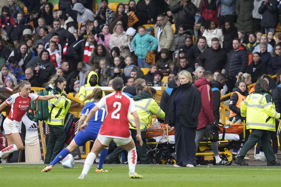 Arsenal's Frida Maanum leaves the pitch on a stretcher after receiving treatment from the medical staff during the FA Women's Continental Tyres League Cup Final at Molineux Stadium, Wolverhampton, England, Sunday March 31, 2024. (Nick Potts/PA via AP)