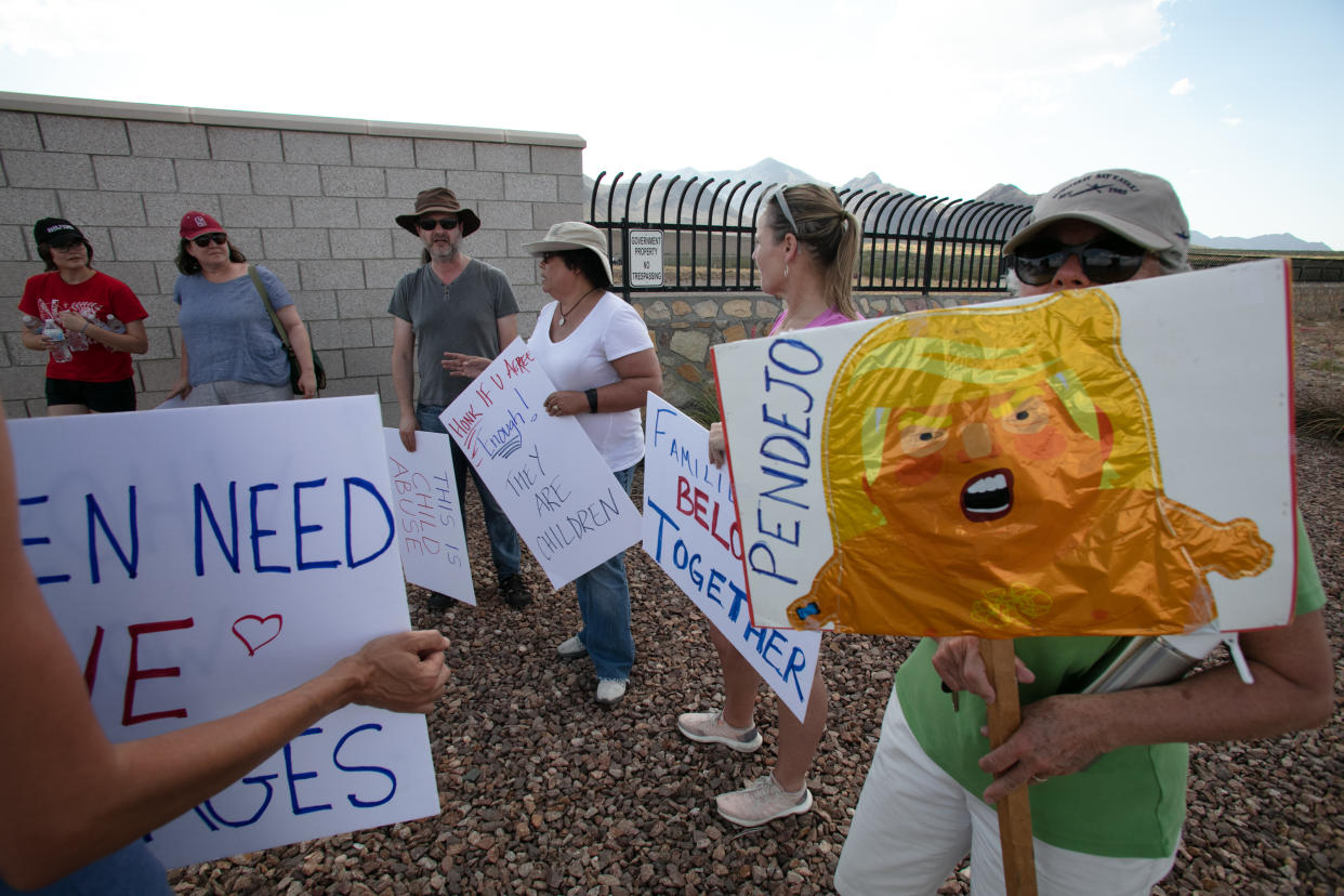 Julie Lythcott-Haims from Northern California, center, organized a caravan to Clint, Texas, to protest the continued separation of migrant children from their families and the conditions they are being held in by CBP, on June 25, in El Paso, Texas. (Photo: Christ Chavez/Getty Images)