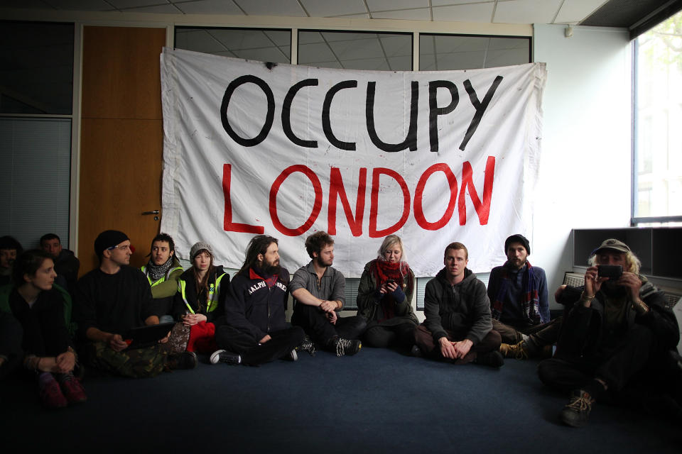 Protestors Occupy An Empty Office Block Owned By UBS In Central London