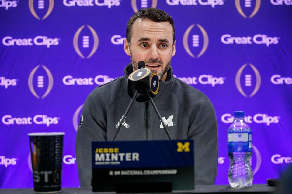 Michigan defensive coordinator Jesse Minter speaks during national championship game media day at George R. Brown Convention Center in Houston, Texas on Saturday, Jan. 6, 2024.