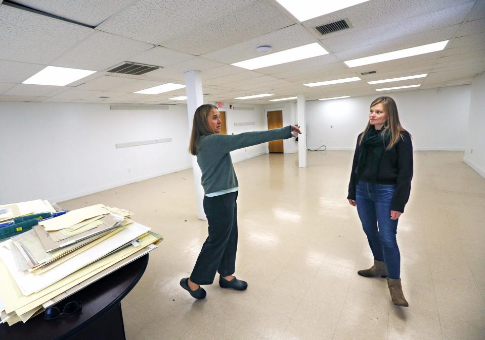 Megan Shapiro-Ross, executive director of Footprints Food Pantry, left, and Emily Flinkstrom, executive director of Fair Tide, talk Tuesday, Oct. 4, 2022 about the space for Mainspring, a new social services hub coming to Kittery, Maine.
