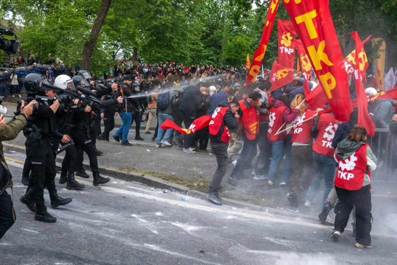 Turkish riot police clash with protesters as they try to reach Taksim Square for an unauthorized May Day rally in Istanbul. Tolga Uluturk/ZUMA Press Wire/dpa