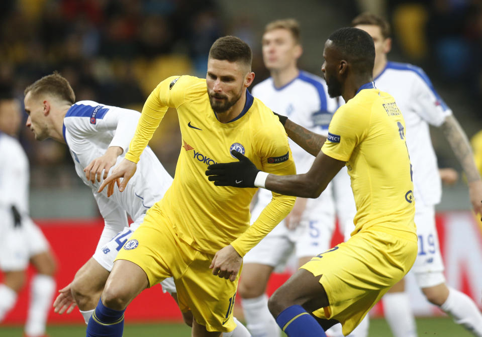 Chelsea's Olivier Giroud celebrates after scoring his side's opening goal during the Europa League round of 16, second leg soccer match between Dynamo Kiev and Chelsea at the Olympiyskiy stadium in Kiev, Ukraine, Thursday, March 14, 2019. (AP Photo/Efrem Lukatsky)