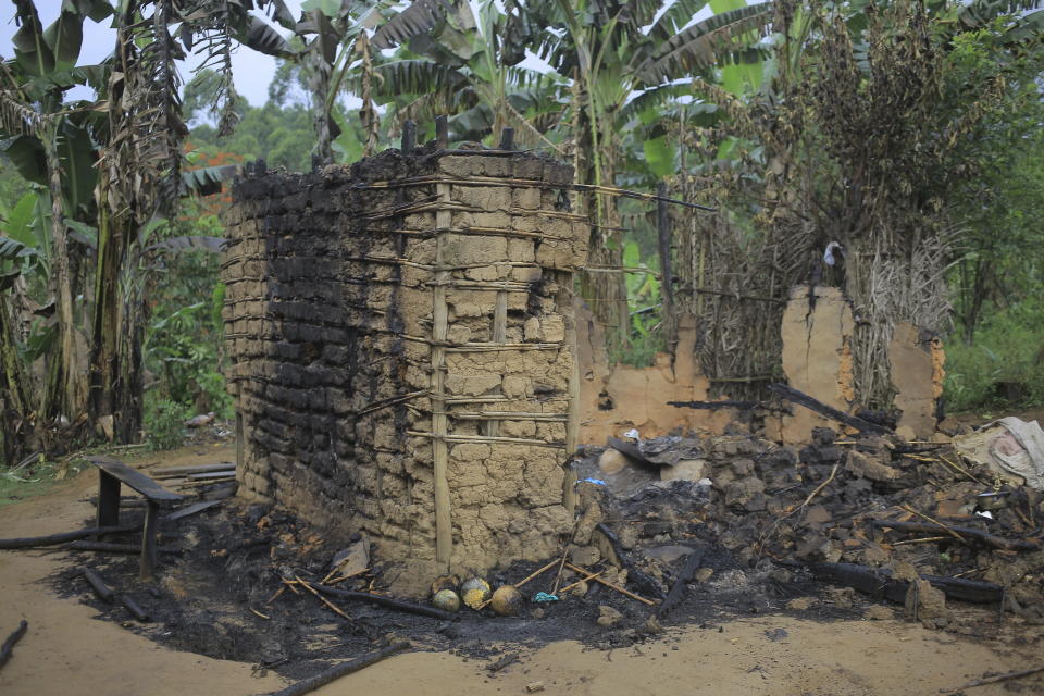 A burnt out hut is seen in the Democratic Republic of Congo North Kivu province village of Mukondi, Thursday March 9, 2023. At least 36 civilians were killed when the Allied Democratic Forces, a group with links to the Islamic State group, attacked the village and burned residents' huts. (AP Photo/Socrate Mumbere)