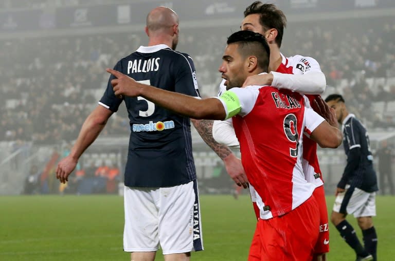 Monaco's Radamel Falcao (2L) celebrates after scoring a goal against Bordeaux at the Matmut Atlantique Stadium in Bordeaux, southwestern France, on December 10, 2016