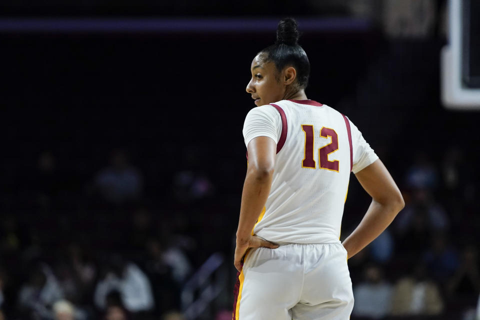 Southern California guard JuJu Watkins stands during a free throw in the first half of an NCAA college basketball game against Cal Poly, Tuesday, Nov. 28, 2023, in Los Angeles. (AP Photo/Ryan Sun)