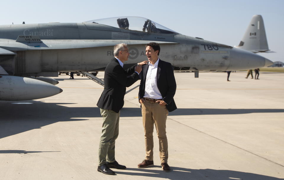 NATO Secretary General Jens Stoltenberg and Prime Minister Justin Trudeau say goodbye at 4 Wing Cold Lake air base in Cold Lake Alta, on Friday Aug. 26, 2022. (Jason Franson /The Canadian Press via AP)