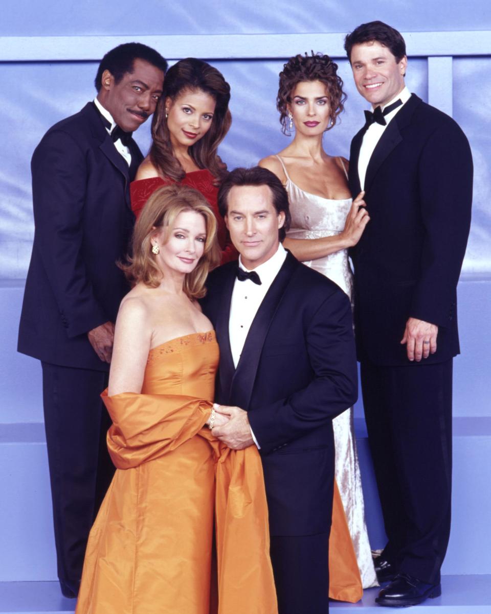 Days Of Our Lives cast members pose at the Golden Globes in the 1990s. 