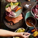 <p>In this family-style meal, a platter full of salmon and roasted and raw vegetables--served with a Northern Italian-inspired garlic-anchovy dip--lets everyone choose their own dining adventure. Serve with crusty bread and white wine. <a href="https://www.eatingwell.com/recipe/259636/salmon-fall-vegetables-with-bagna-cauda/" rel="nofollow noopener" target="_blank" data-ylk="slk:View Recipe" class="link ">View Recipe</a></p>