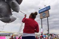FILE PHOTO: People pay their respects three days after a mass shooting in El Paso