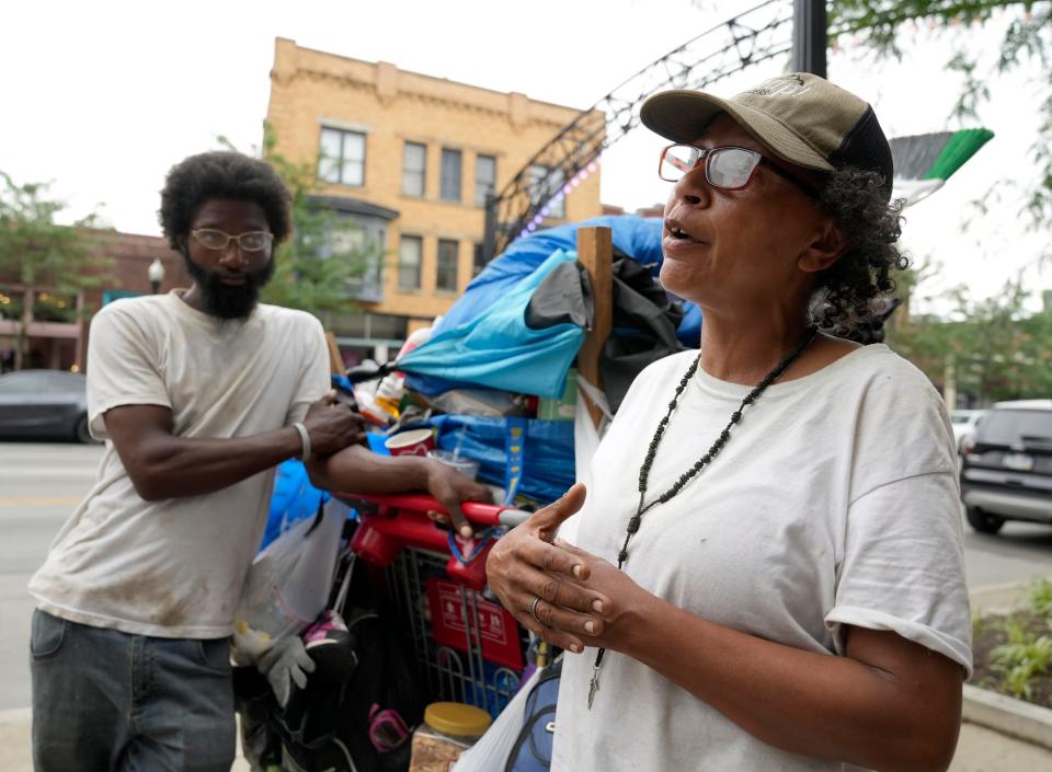 Hattie Cage, 52, right, and her son Dontaye Cage, 33, recount what they saw early Sunday morning. The two are unhoused and were sleeping near the scene of Sunday morning’s mass shooting in the Short North. They awoke to the aftermath and recounted the chaos along the 1100 block of North High Street.