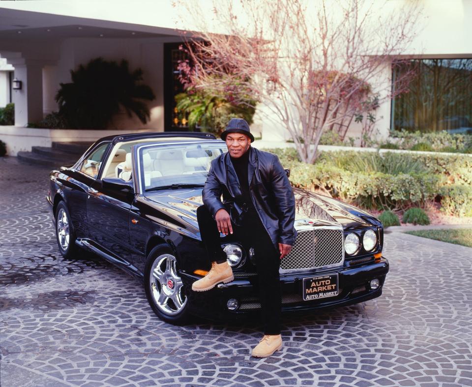 Mike Tyson and his Bentley in 2000.