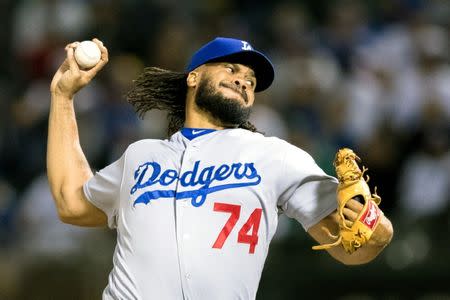 Aug 7, 2018; Oakland, CA, USA; Los Angeles Dodgers relief pitcher Kenley Jansen (74) throws against the Oakland Athletics in the ninth inning at Oakland Coliseum. John Hefti-USA TODAY Sports