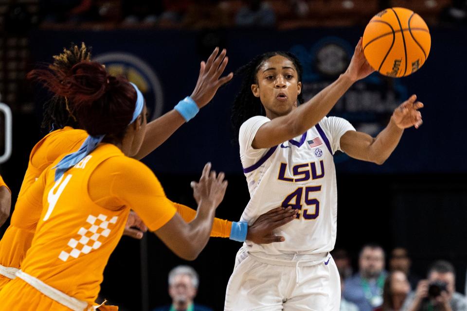 LSU's Alexis Morris (45) passes the ball against Tennessee in the first half of an NCAA college basketball game during the Southeastern Conference women's tournament in Greenville, S.C., Saturday, March 4, 2023. (AP Photo/Mic Smith)