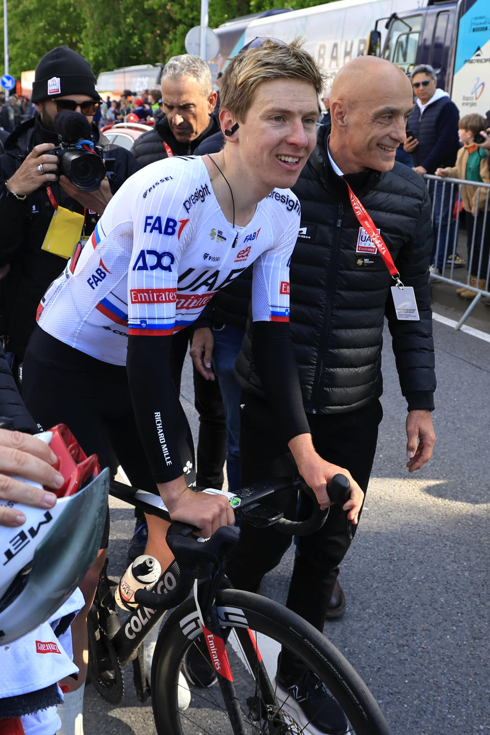 Slovenia's Tadej Pogacar of the UAE Emirates team after crossing the finish line to win the Belgian cycling classic and UCI World Tour race Liege Bastogne Liege, in Liege, Belgium, Sunday, April 21, 2024. (AP Photo/Geert Vanden Wijngaert)