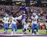 <p>Minnesota Vikings running back Dalvin Cook (33) celebrates after scoring against the Detroit Lions in the first half at U.S. Bank Stadium. Mandatory Credit: Reese Strickland-USA TODAY Sports </p>
