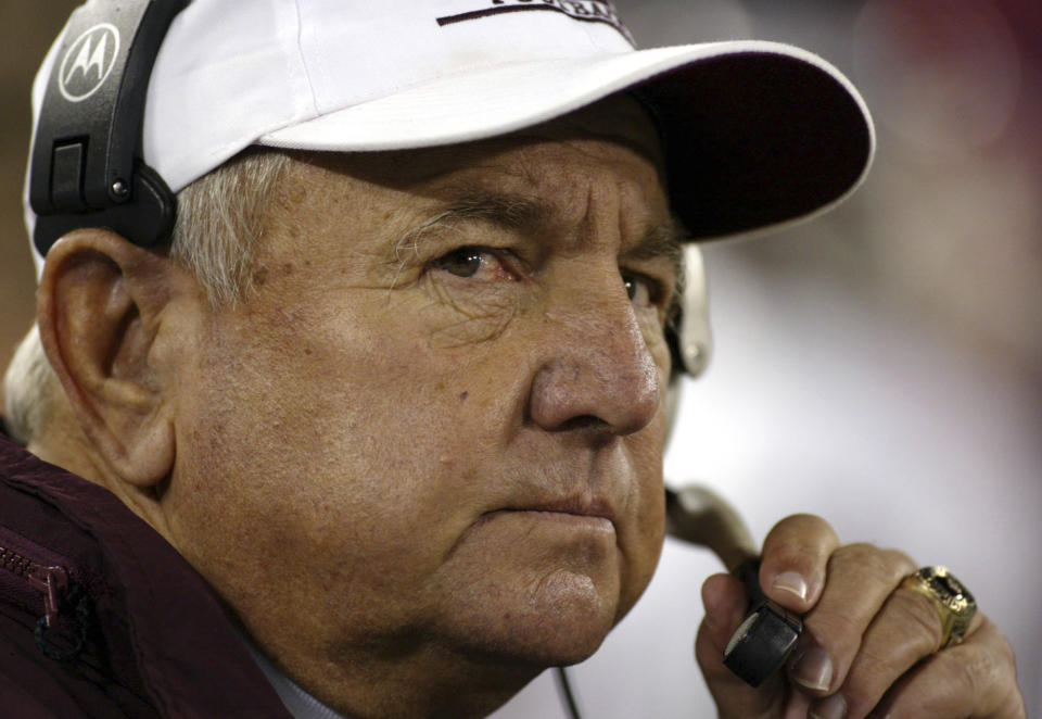 FILE - Eastern Kentucky University NCAA college football head coach Roy Kidd watches from the sidelines during his last game coaching, against Tennessee State, in Nashville, Tenn., Nov. 21, 2002. Kidd, who coached Eastern Kentucky to two NCAA Division I-AA football championships in a Hall of Fame career, has died. He was 91. The school announced Kidd’s death on Tuesday, Sept. 12, 2023, in a release after being informed by the family.( AP Photo/Neil Brake, File)