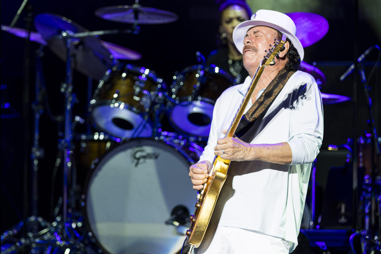 Image: Carlos Santana performs at Pine Knob Music Theatre in Clarkston, Mich., on July 5, 2022. (Scott Legato / Getty Images)