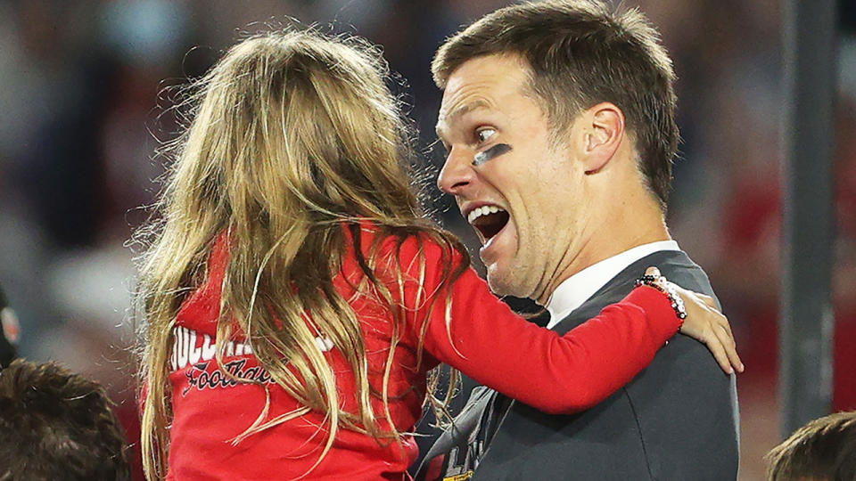 Tom Brady hugs his daughter Vivian after defeating the Kansas City Chiefs 31-9 in Super Bowl LV. (Photo by Patrick Smith/Getty Images)