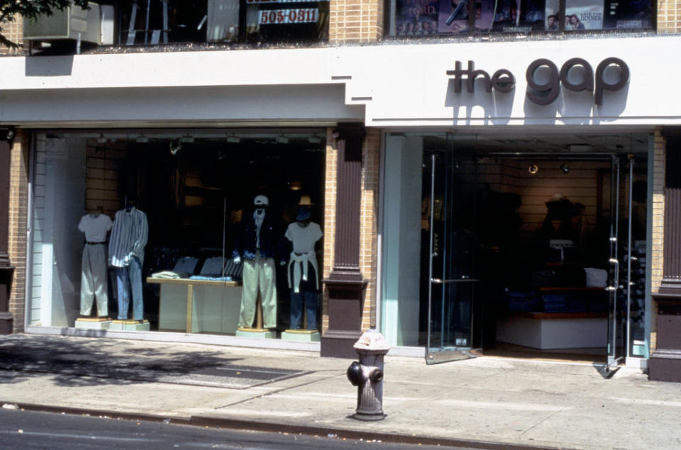 Storefront of "the GAP" with mannequins wearing casual attire