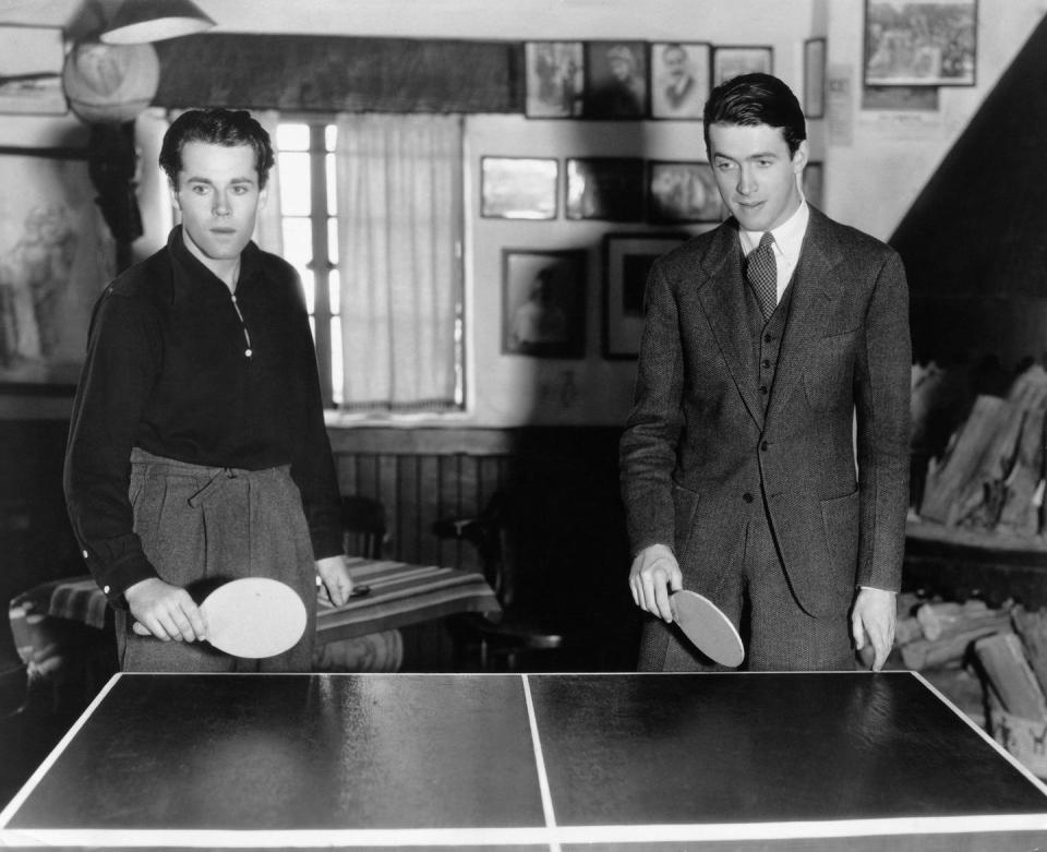 <p>Henry Fonda and James Stewart play a game of ping pong, circa 1937.</p>