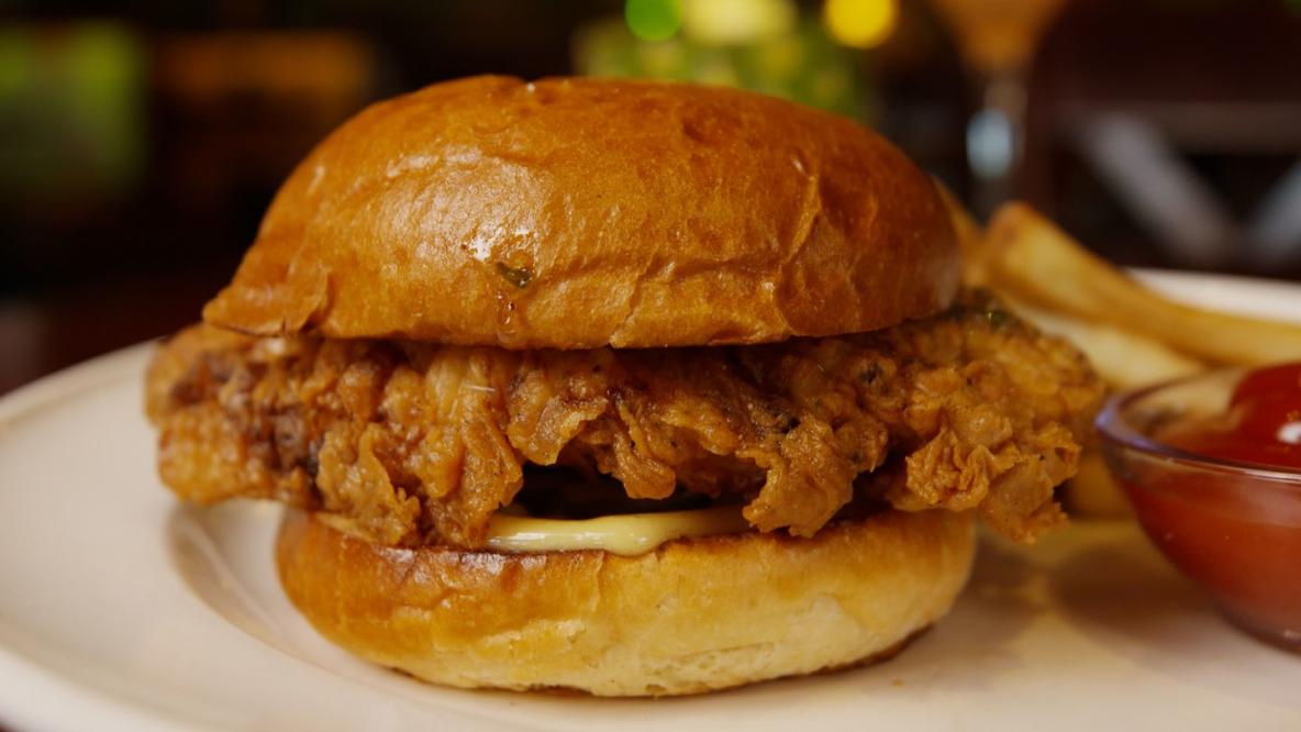Bahama Breeze Island Grille - We don't mean to make choosing what to order  any harder but our new Honey Butter Chicken Sandwich just hit the menu.  😍 The crispy chicken with