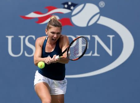 Sep 5, 2016; New York, NY, USA; Simona Halep of Romania hits to Carla Suarez Navarro of Spain on day eight of the 2016 U.S. Open tennis tournament at USTA Billie Jean King National Tennis Center. Mandatory Credit: Jerry Lai-USA TODAY Sports