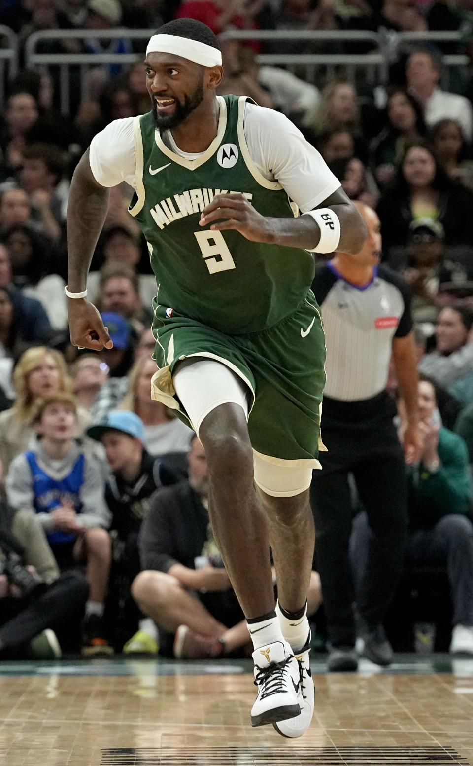 Milwaukee Bucks forward Bobby Portis (9) is all smiles after hitting a three-point shot during the first half of their game against the Orlando Magic Wednesday, April 10, 2024 at Fiserv Forum in Milwaukee, Wisconsin.