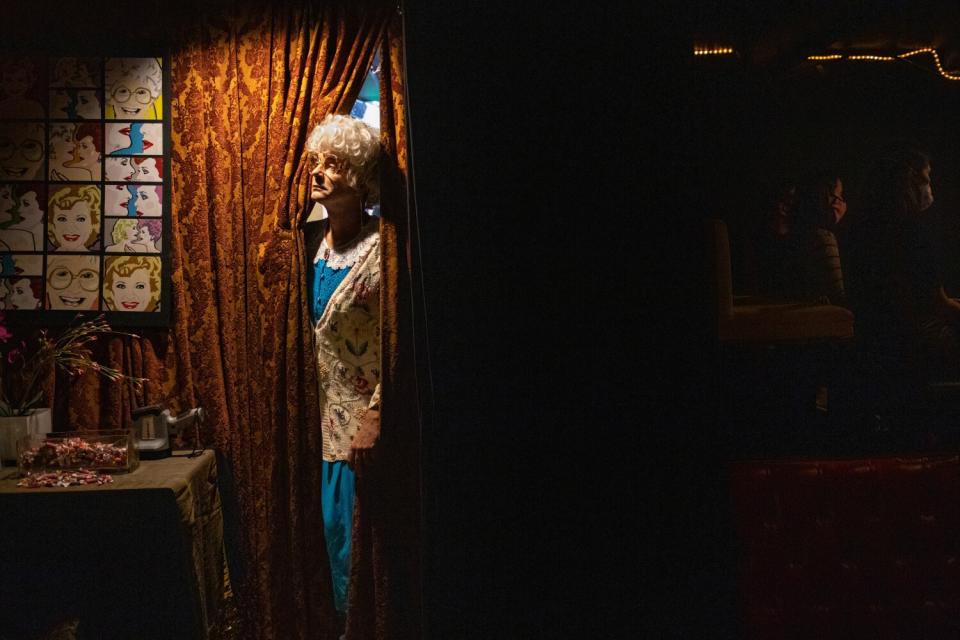 Sam Pancake, who played Sophia Petrillo, looks out from the curtain backstage.