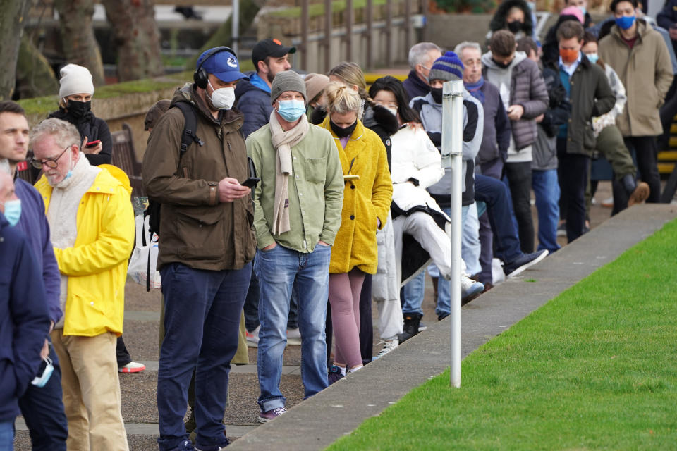 People queuing for booster jabs at St Thomas' Hospital, London. Everyone over 18 in England will be offered booster jabs from this week, Prime Minister Boris Johnson said on Sunday night, as he declared an 