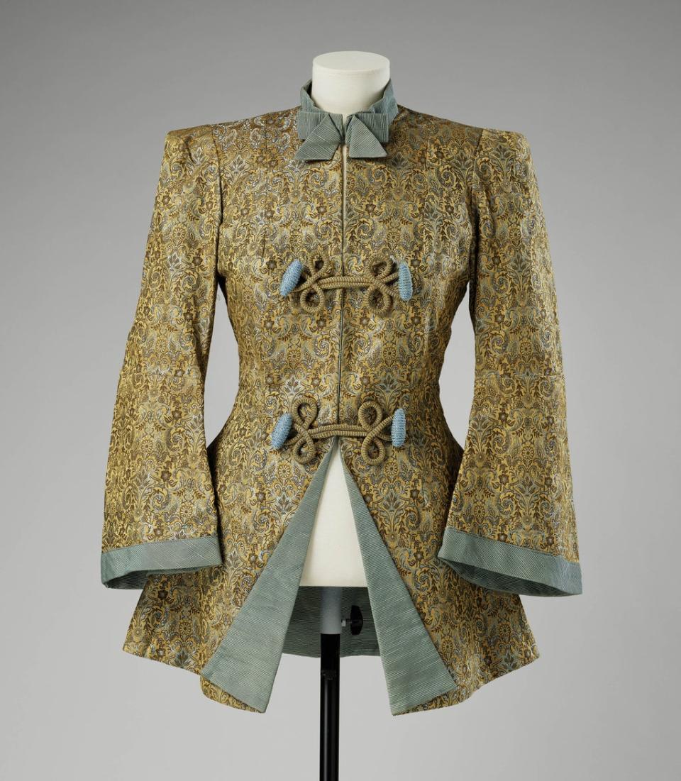 The gold brocade and turquoise jacket, worn by Princess Elizabeth to play Aladdin in 1943 (Royal Collection/PA) (PA Media)