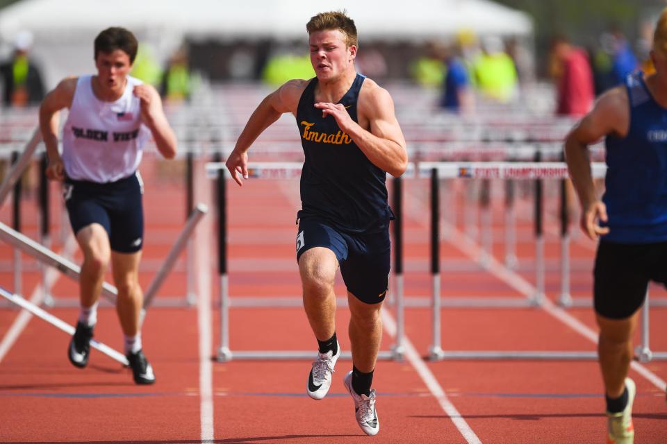 Timnath's Vince Hochhalter crosses the finish line during the Class 2A boys 110 meter hurdles at the Colorado high school track and field state meet at Jeffco Stadium on Saturday, May 20, 2023, in Lakewood, Colo.